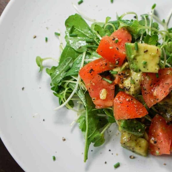 Quick, Easy and Nutritious Salad: Tomato and Avo on Arugula and Micro Greens