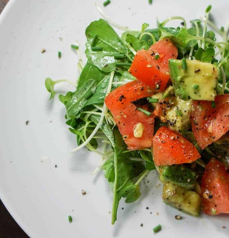 Quick, Easy and Nutritious Salad: Tomato and Avo on Arugula and Micro Greens