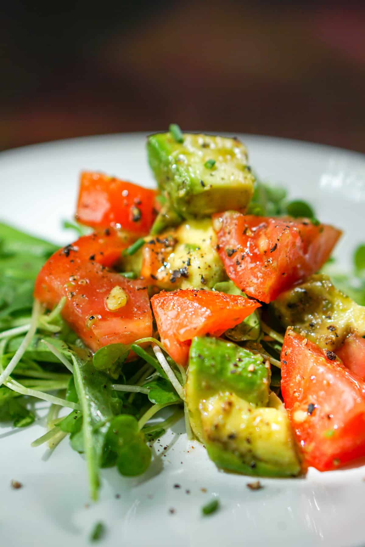Quick, Easy and Nutritious Salad: Tomato and Avo on Arugula and Micro Greens