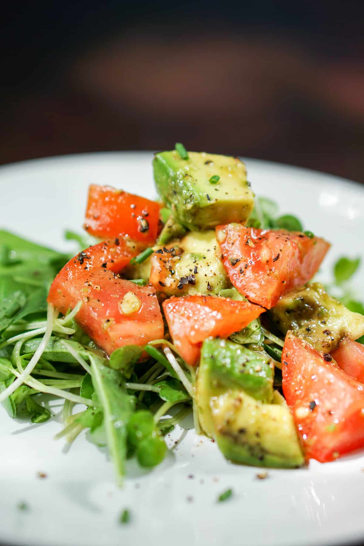 Quick, Easy and Nutritious Salad: Tomato and Avo on Arugula and Micro Greens