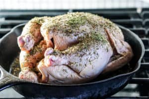 Simple Whole Roasted Herb Chicken Recipe - Just 5 minutes of active time and 1 hour baking for this clean eating head-to-toe recipe