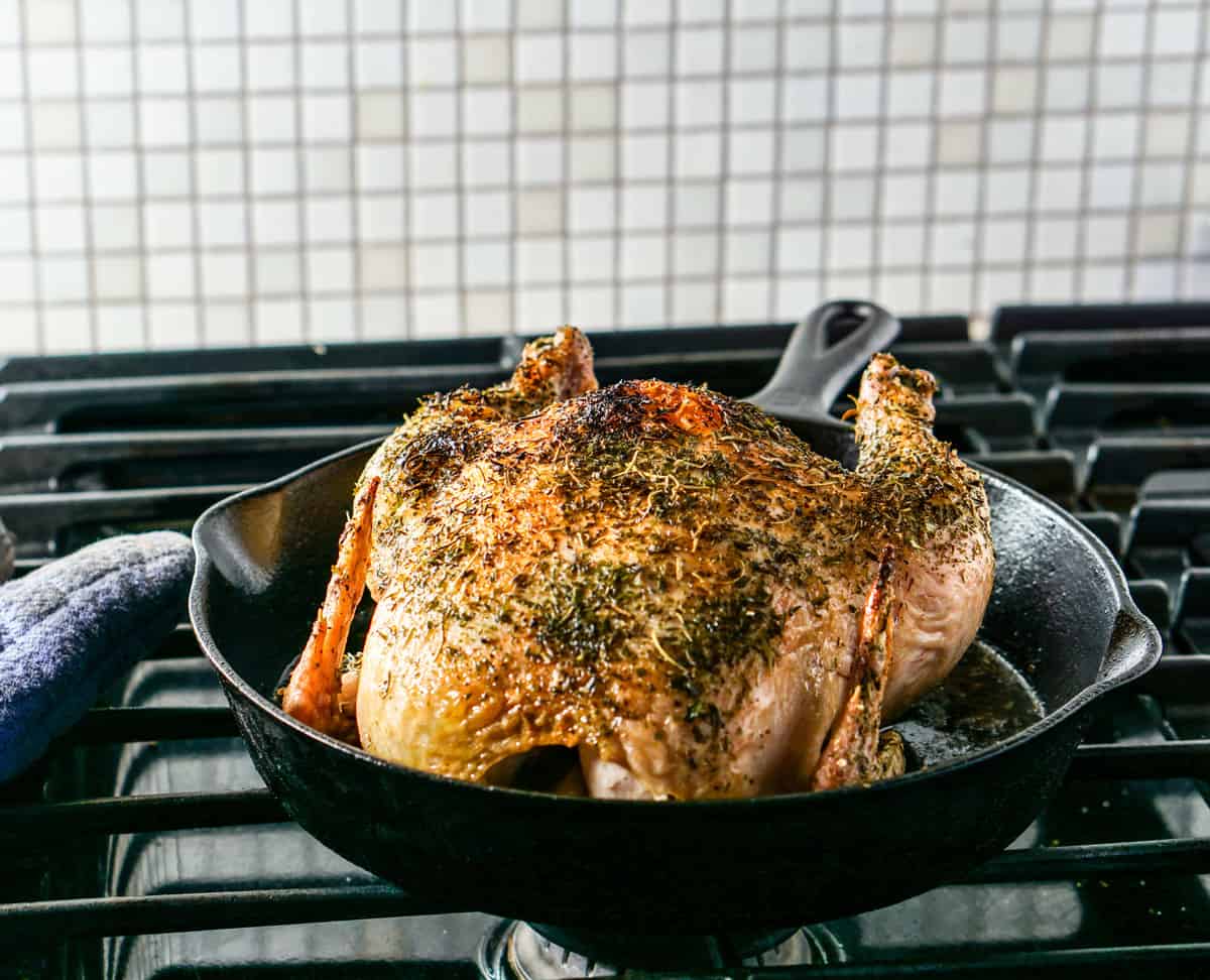 Simple Whole Roasted Herb Chicken Recipe - Just 5 minutes of active time and 1 hour baking for this clean eating head-to-toe recipe