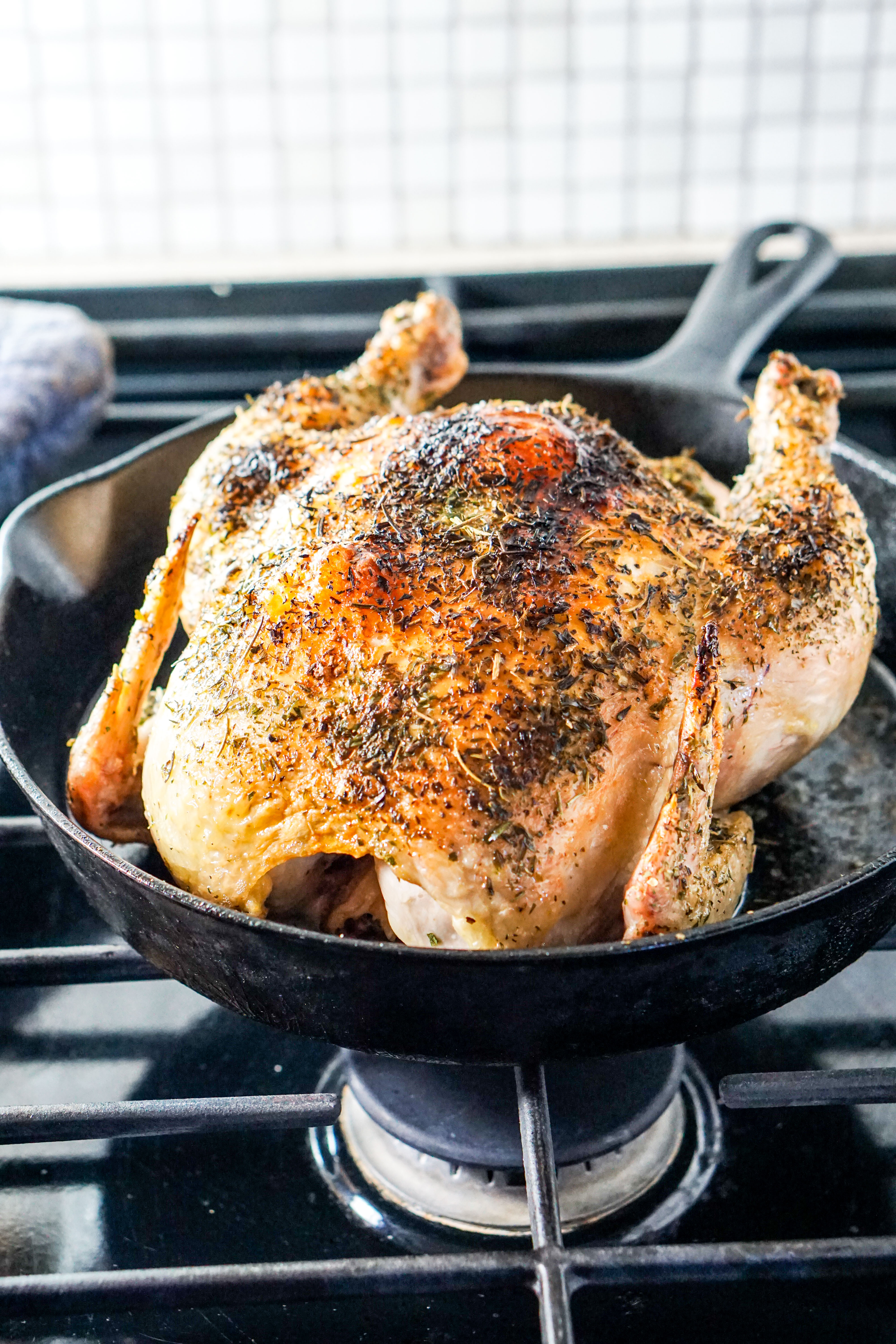 Simple Whole Roasted Herb Chicken Recipe - Just 5 minutes of active time and 1 hour baking for this clean eating head-to-toe recipe