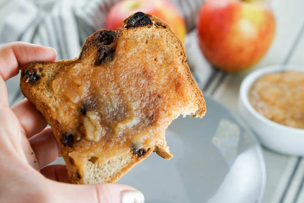 Apple Butter Recipe - A perfect and healthy spread made from just apples, salt and a dash of cinnamon. Spread on toast, muffins, pancakes, or just by itself