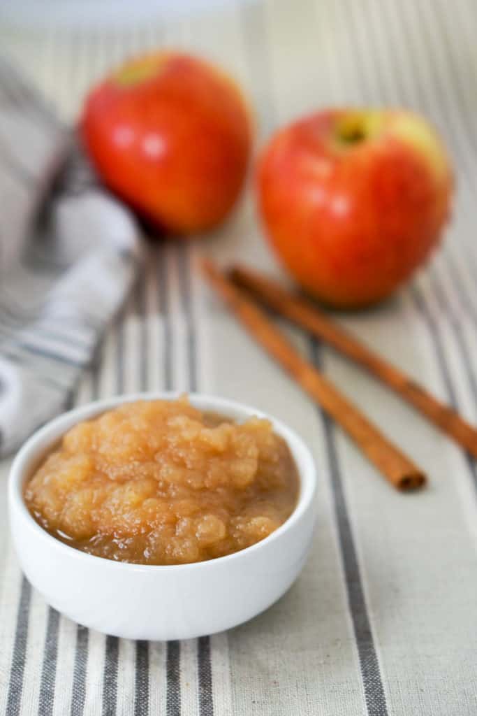 Apple Butter Recipe - A perfect and healthy spread made from just apples, salt and a dash of cinnamon. Spread on toast, muffins, pancakes, or just by itself