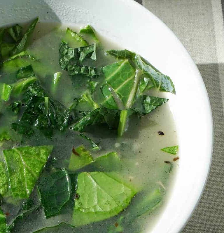 Try this nourishing bone broth over winter greens recipe is a quick and healthy meal that will reset your body after overindulging. Healthy + Delicious