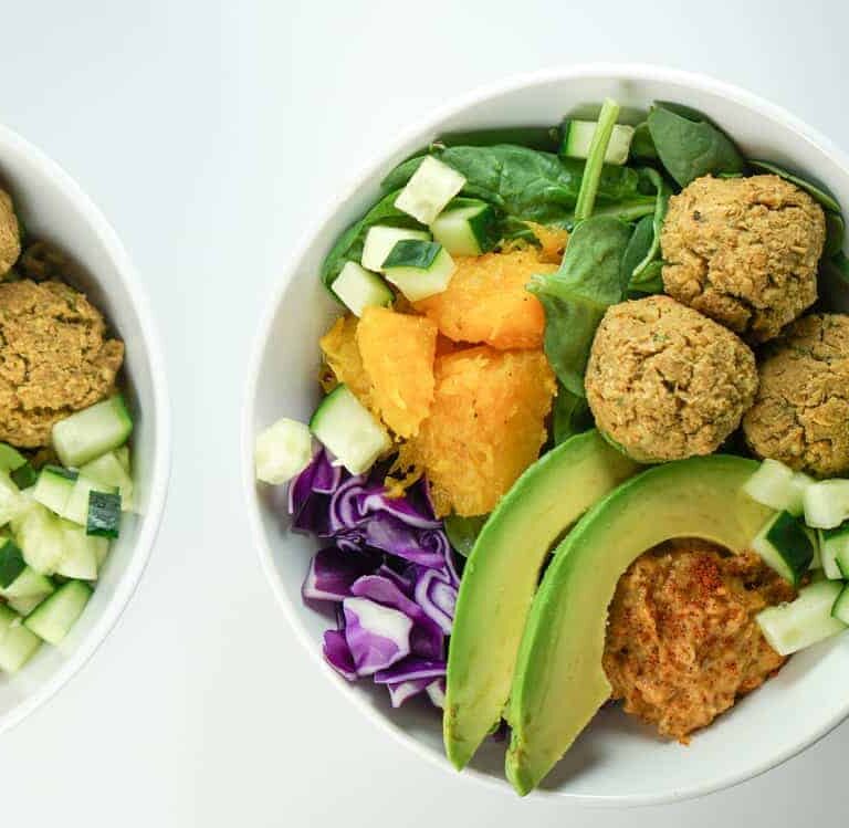 Quick, fresh and Easy falafel bowls with roasted squash, avocado and harissa hummus recipe. A perfect healthy dinner. Absolutely delish and satisfying.