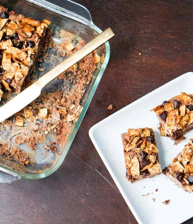 Chocolate Masala Fudge squares take cinnamon, cardamom fudge to the next level. Packed with ginger, dates, and coconut - this decadent treat is healthy!
