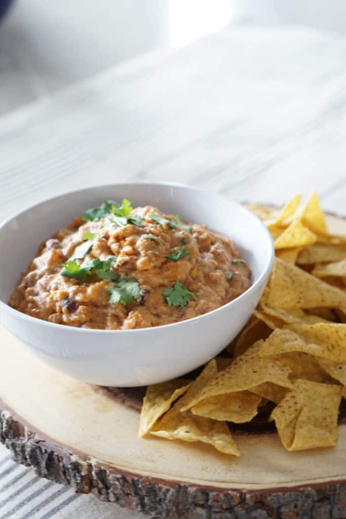 A creamy savory chip dip that's sure to be a crowd pleaser. They'll never know that its healthy and has no cheese! Ground beef, hummus, salsa and spices.