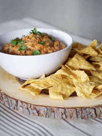 Healthy Creamy Chip Dip Recipe: A creamy savory chip dip that's sure to be a crowd pleaser. They'll never know that its healthy and has no cheese! Ground beef, hummus, salsa and spices.