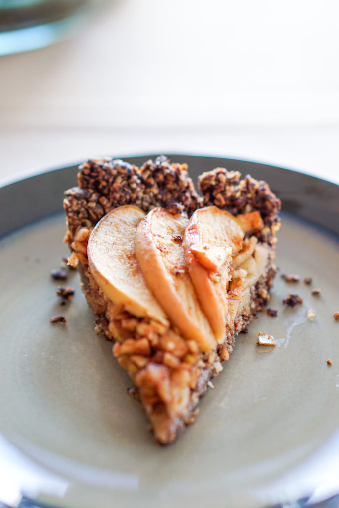 Apple Tart with Drop Cookie Crust Recipe: Warm spiced apples wrapped in a comforting chocolate drop cookie crust. Gluten, dairy, and refined sugar free.