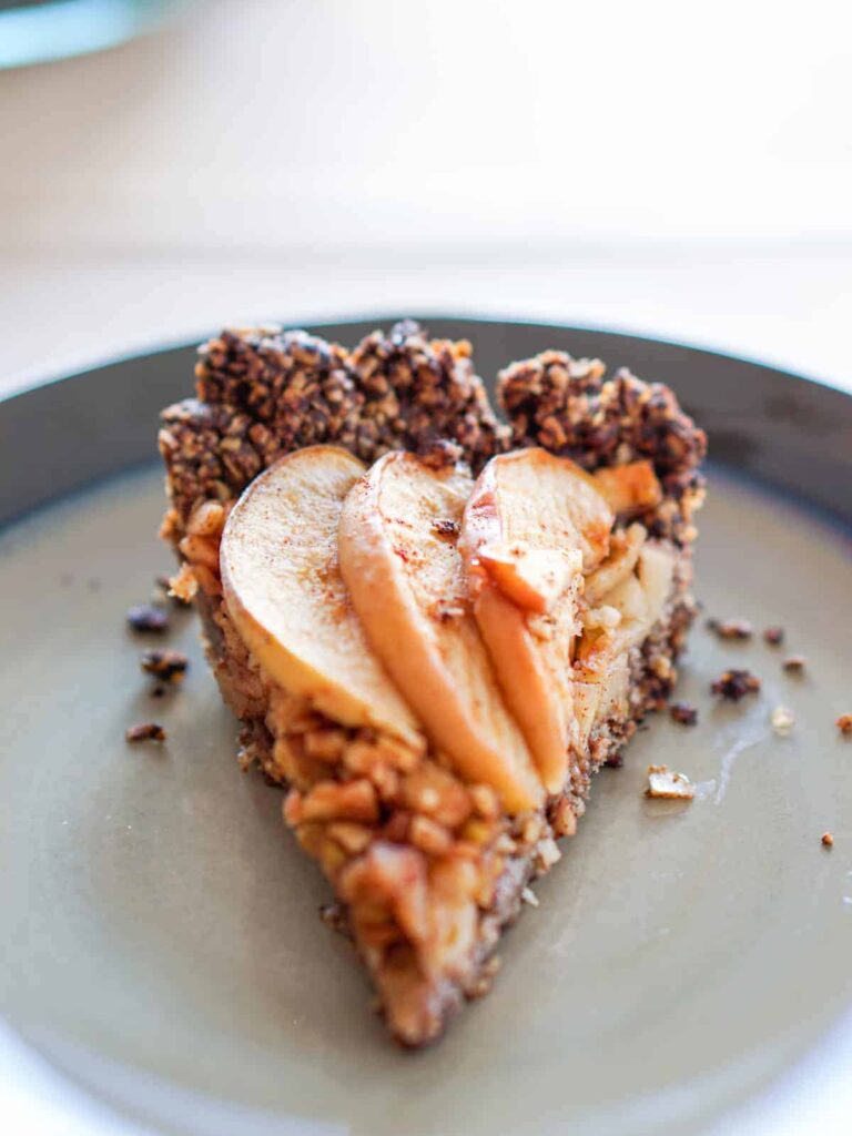 Apple Tart with Drop Cookie Crust Recipe: Warm spiced apples wrapped in a comforting chocolate drop cookie crust. Gluten, dairy, and refined sugar free.