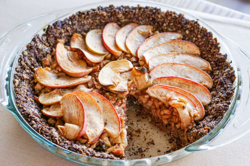 Apple Tart with Drop Cookie Crust Recipe: Warm spiced apples wrapped in a comforting chocolate drop cookie crust. Gluten, dairy, and refined sugar free.