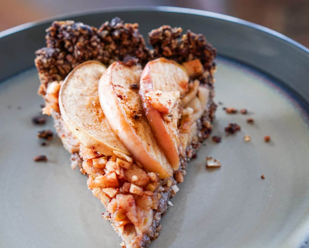 Apple Tart with Drop Cookie Crust Recipe: Warm spiced apples wrapped in a comforting chocolate drop cookie crust. Gluten, dairy, and refined sugar free.