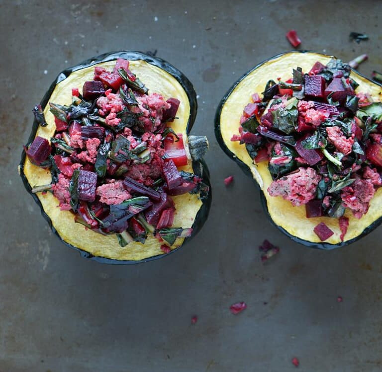 A healthy paleo and whole 30 friendly dinner idea: Beet, Dandelion and Grass-Fed Beef Stuffed Acorn Squash recipe full of protein,vegetables and greens