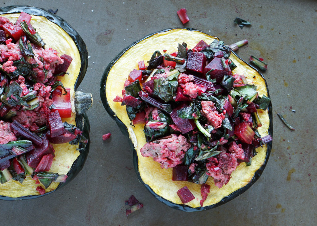 A healthy paleo and whole 30 friendly dinner idea: Beet, Dandelion and Grass-Fed Beef Stuffed Acorn Squash recipe full of protein,vegetables and greens