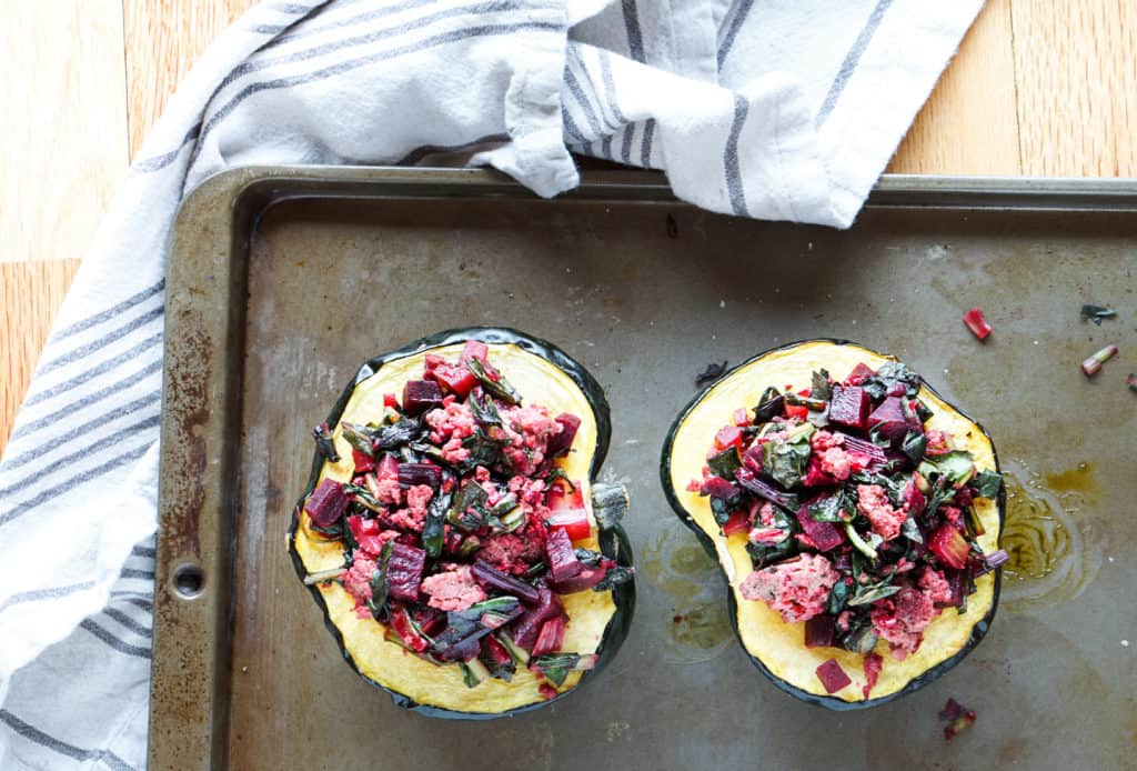 A healthy paleo and whole 30 friendly dinner idea: Beet, Dandelion and Grass-Fed Beef Stuffed Acorn Squash recipe full of protein,vegetables and greens