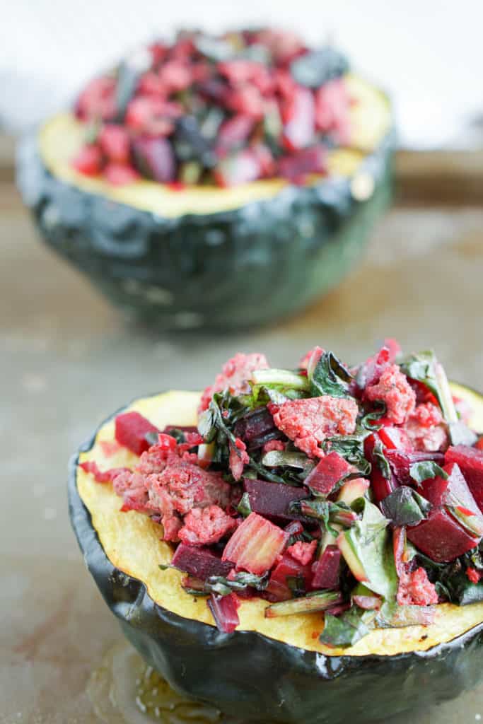 A healthy paleo and whole 30 friendly dinner idea: Beet, Dandelion and Grass-Fed Beef Stuffed Acorn Squash recipe full of protein,vegetables and greens