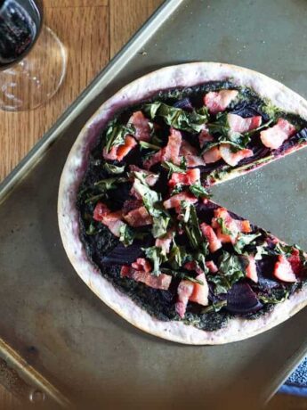 The healthiest pizza on earth. This gluten free, dairy free Beet and Dandelion Flatbread Recipe is chocked full of detoxing nutrients. Perfect spring meal.