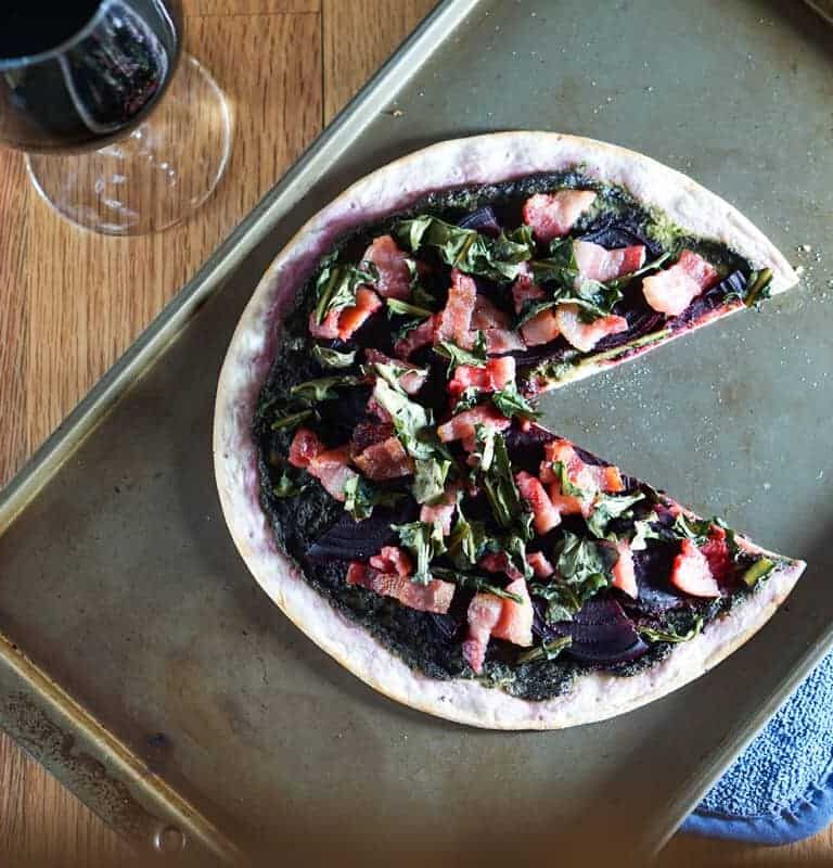 The healthiest pizza on earth. This gluten free, dairy free Beet and Dandelion Flatbread Recipe is chocked full of detoxing nutrients. Perfect spring meal.