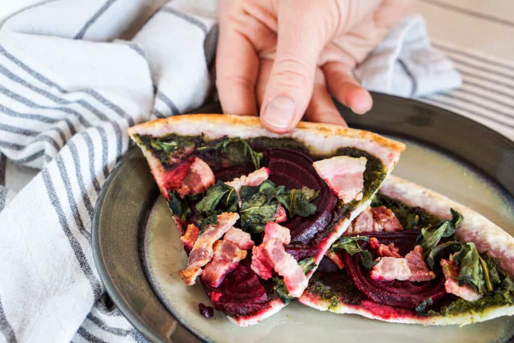 The healthiest pizza on earth. This gluten free, dairy free Beet and Dandelion Flatbread Recipe is chocked full of detoxing nutrients. Perfect spring meal.