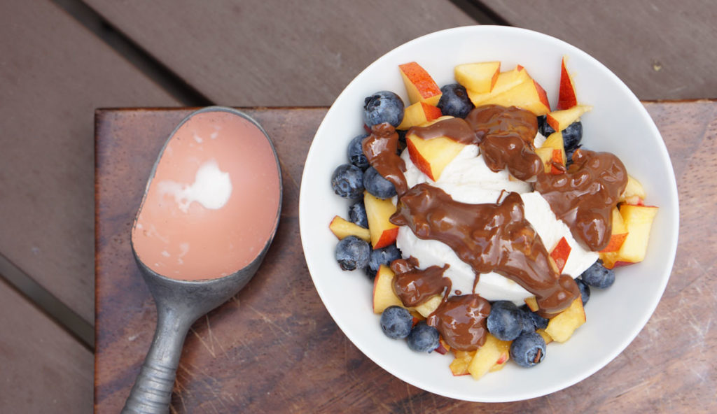 Fresh berries, creamy coconut ice cream, healthy magic shell make this great dairy free coconut berry sundae with homemade peanut butter chocolate drizzle