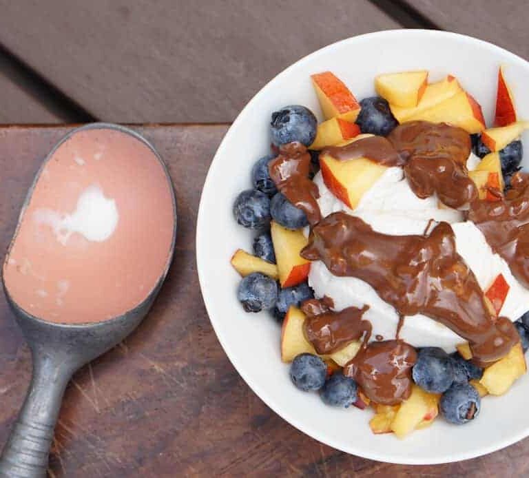 Fresh berries, creamy coconut ice cream, healthy magic shell make this great dairy free coconut berry sundae with homemade peanut butter chocolate drizzle