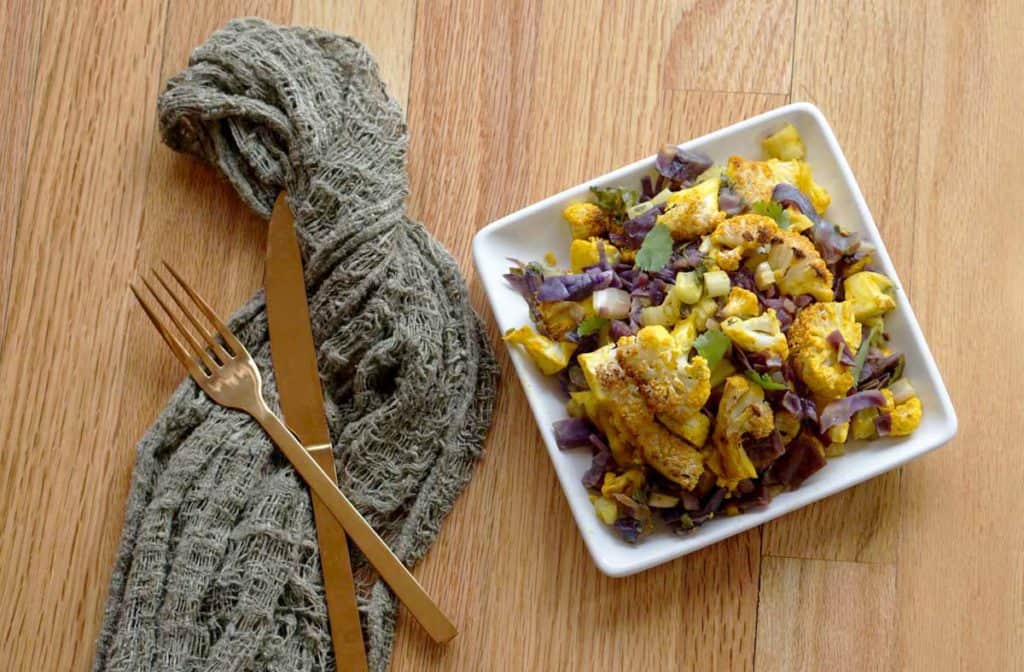 This easy and hearty AIP friendly Turmeric Cauliflower Bake Recipe is the perfect new staple for your paleo, grain free, and gluten free lifestyle.