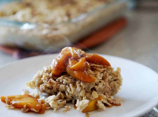 This easy egg alternative will save time in the mornings. Gluten free, dairy free, refined sugar free, paleo and vegan healthy baked oatmeal made with peaches and rhubarb recipe with just enough cinnamon and nutmeg.