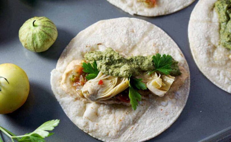 quick and easy tacos, made with hummus, salsa, and marinated artichoke hearts. Quick and easy meatless monday meal