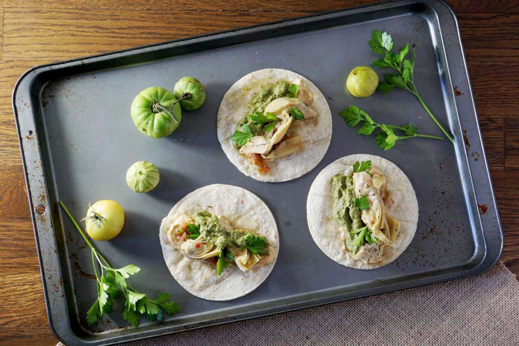 quick and easy tacos, made with hummus, salsa, and marinated artichoke hearts. Quick and easy meatless monday meal