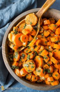 Morrocan Carrots are one of 19 deceptively easy Thanksgiving side dishes to impress your friends. And they are actually healthy and good for you! Gluten free, dairy free, paleo and vegan options so everyone can enjoy!