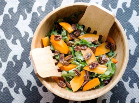 This quick salad is ready in minutes and brings some freshness to classically fall flavors. Just mix persimmons, arugula, toasted pecans and spice together for a naturally paleo and gluten free salad.