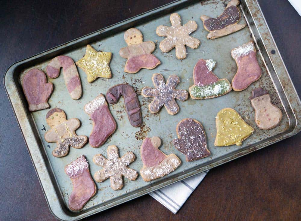 All natural Vintage looking cut out cookies made with 2 ingredient healthy blender frosting and naturally colored with beet, turmeric, spinach, blueberry and cocoa. 