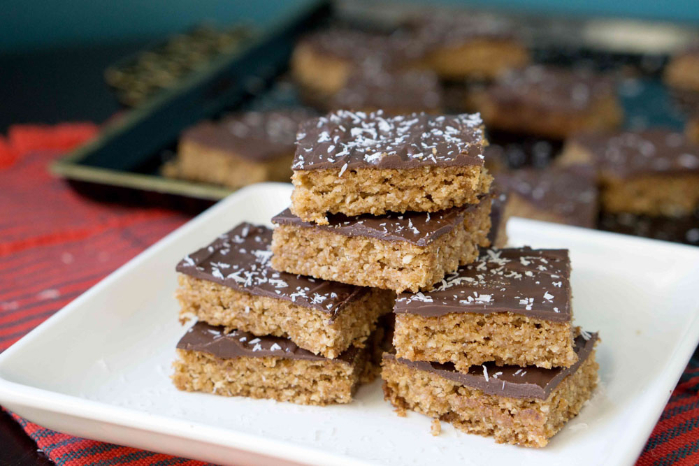 Grandma's classic English Toffee Bars transformed into a healthier and more delicious version. Melt in your mouth goodness that's gluten, dairy and refined sugar free.