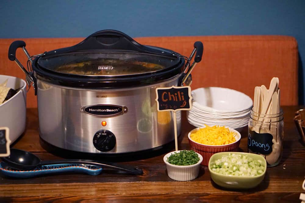 A chili bar is a great make ahead meal idea for a lumberjack themed party