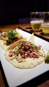 A flight of tacos and beer from San Juan del Sur Cerveceria. The grilled fish were the best