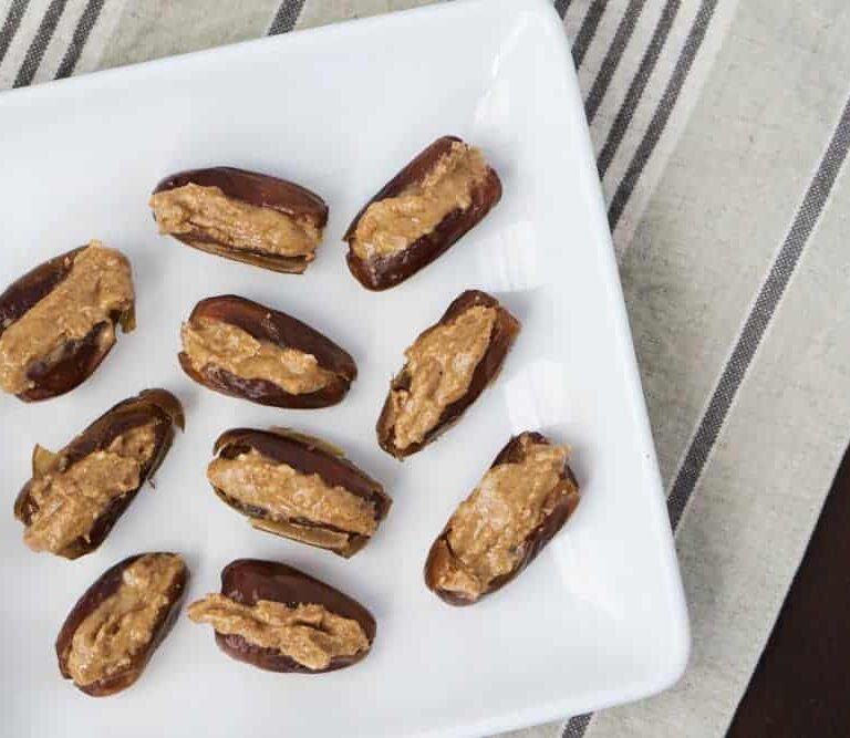 Almond coconut date bombs are a simple fat bomb that's high protein, high fat, and low carb. Great for the 3 pm slump to keep you nourished, balance blood sugars and regulate your hunger signals.