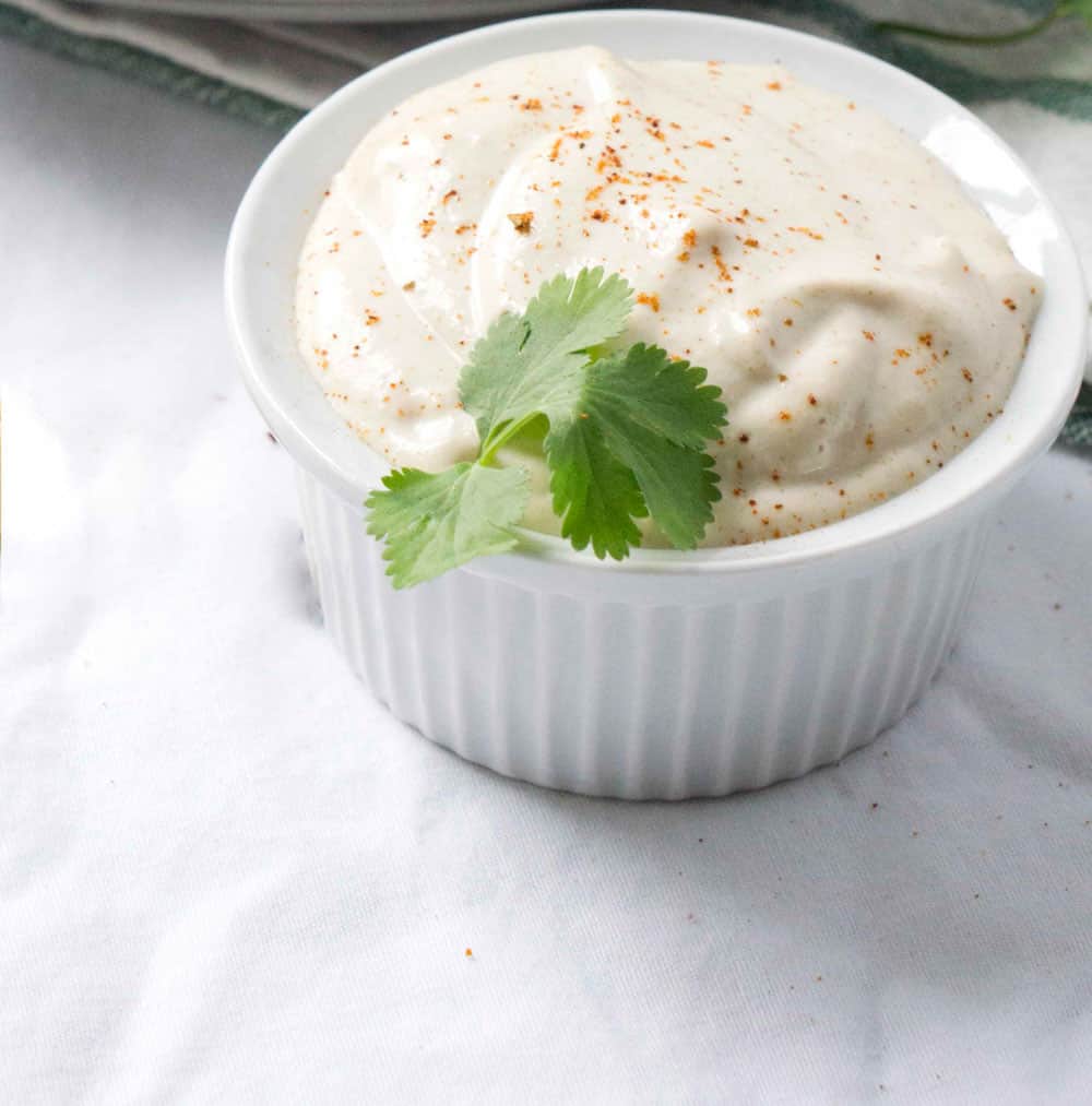 Whipped Tahini Sauce will be your new favorite dairy-free and vegan cream sauce, made in minutes using a blender and delicious on everything.