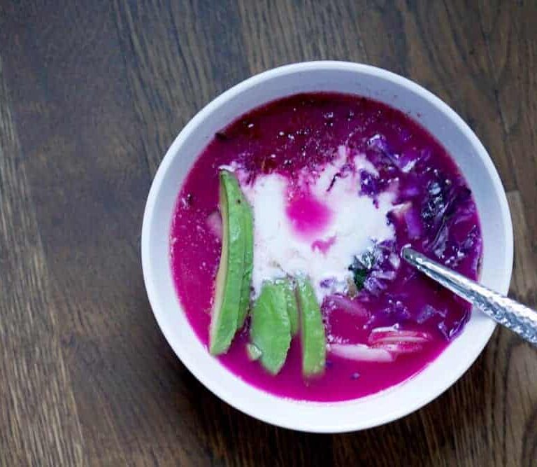 Beautifully Pink Bone Broth Bowl with cucumber, radish, cabbage, and beet