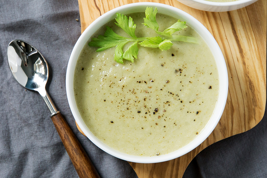 Paleo cream of celery soup recipe without the cream? This refreshing gluten free, dairy free soup uses cauliflower and healthy oils instead.