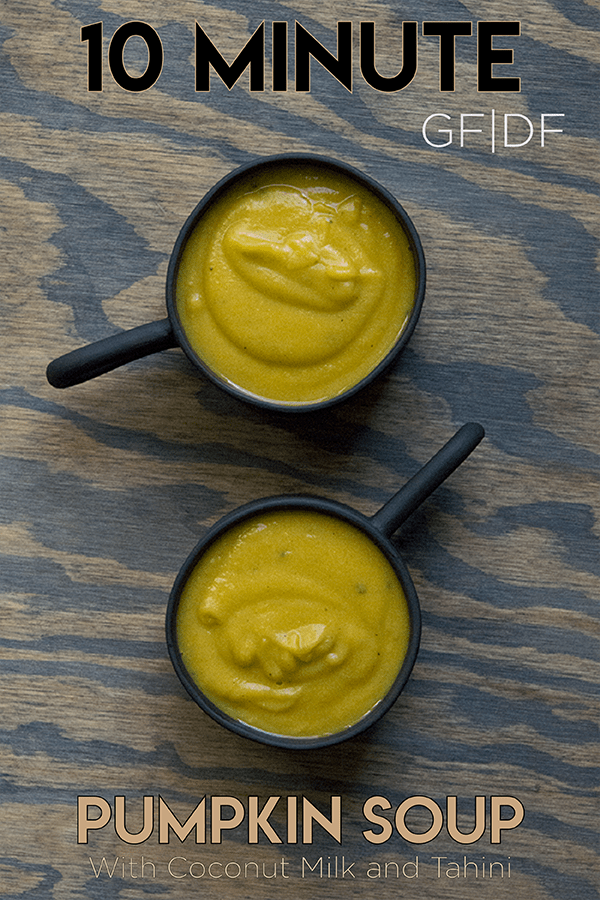 Simple blended 10 minute pumpkin soup with coconut milk and tahini in a black mug. GLuten free, dairy free, whole 30, paleo, and keto