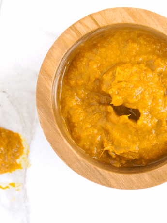 orange Ginger Turmeric Honey Chili Sauce with Dried Red Chilies is spicy, tangy and fresh, making a great marinade, dip, and homemade hot sauce. It's also chocked full of superfoods. in wooden 