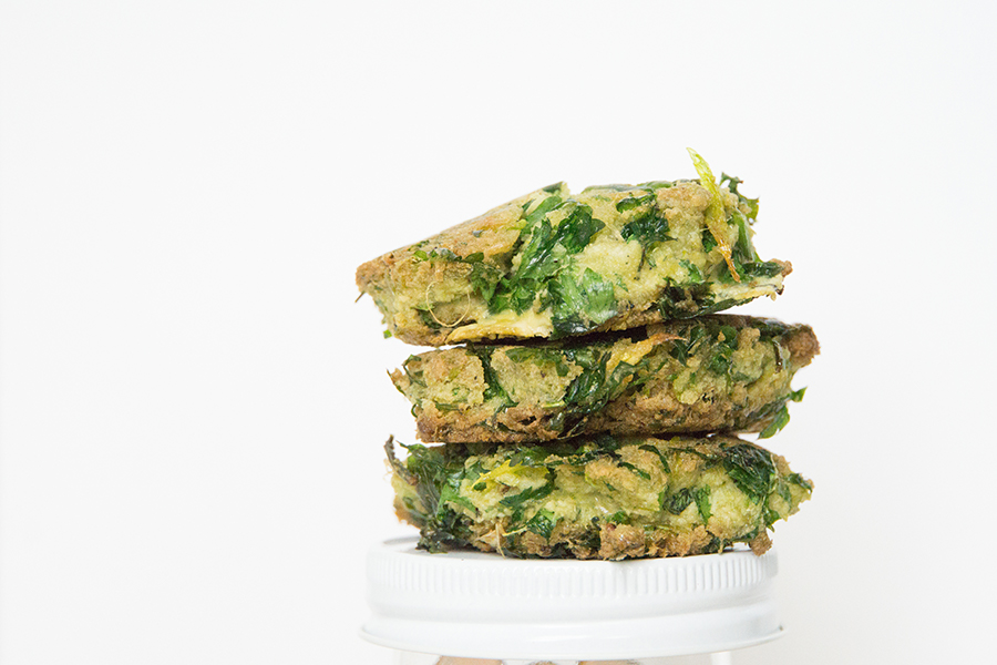 3 stacked Celery Pulp Fritters on white background