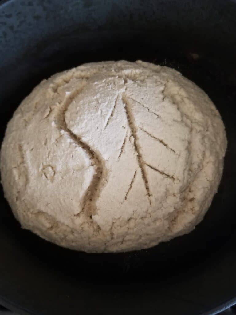 Scored bread before baking