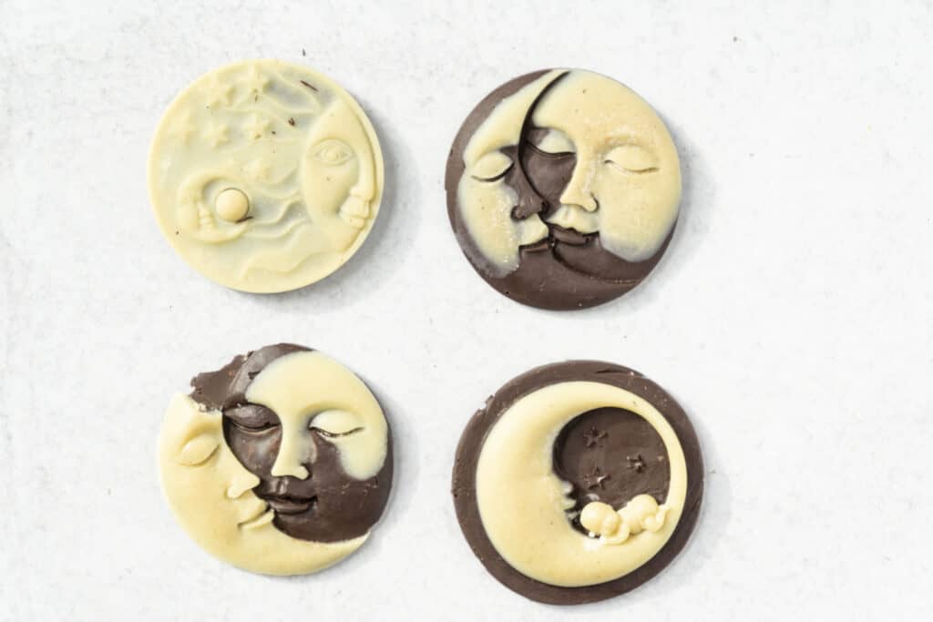 dark and white chocolate in four different sun and moon molds