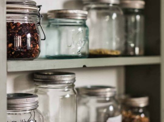 A clean pantry using mason jars to store bulk foods