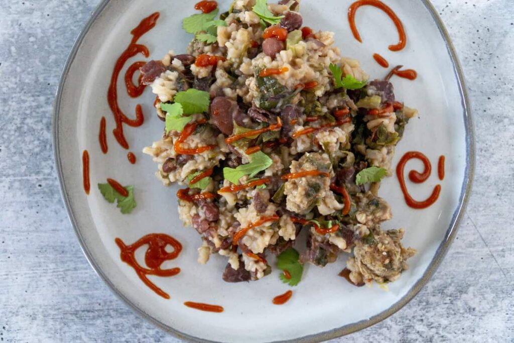 Red beans and Rice with Greens and sriracha swirls