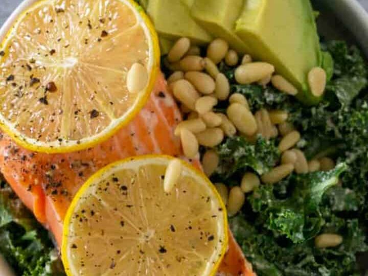 Avocado, Pine Nuts, and Lemon Baked Salmon on Kale Salad