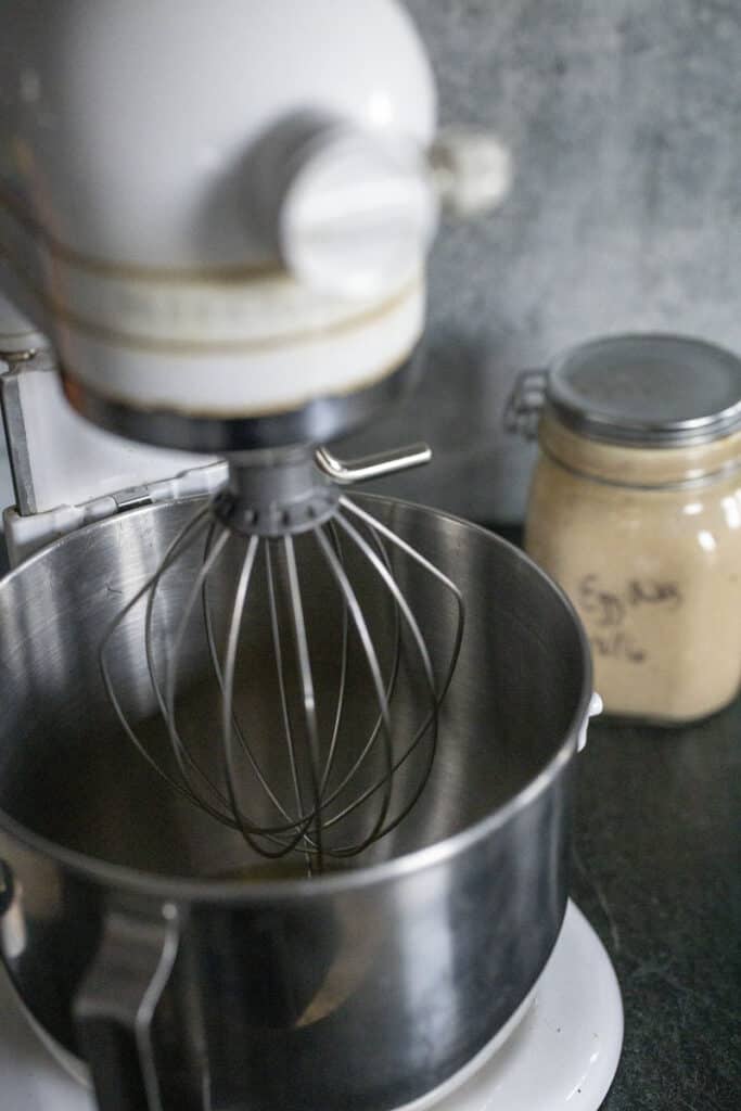 Kitchen aid mixer for egg whites, eggnog in background